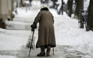 old-lady-walking-in-snow